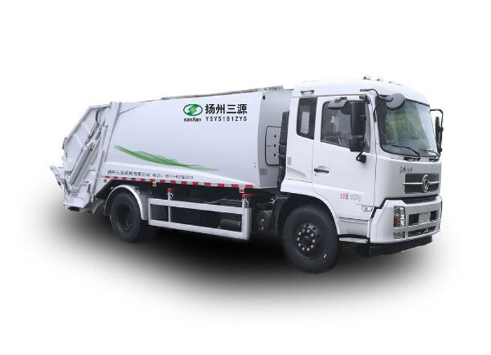 What is the main purpose of a compression garbage truck?